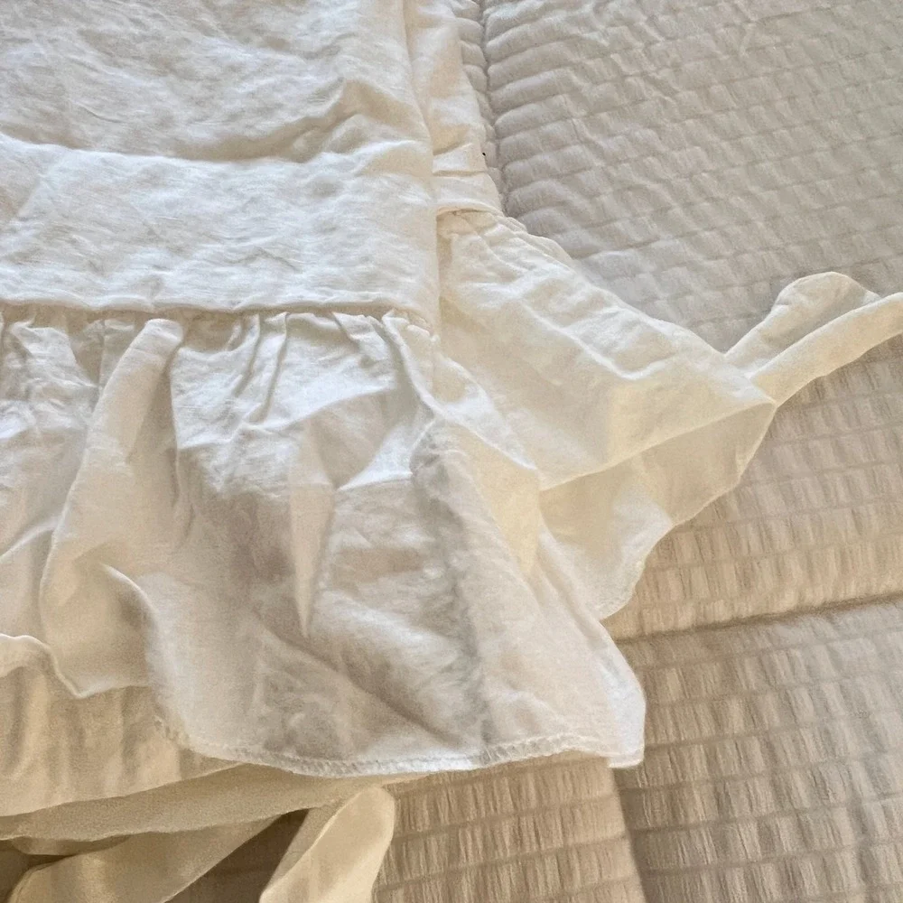 The White Linen Farmhouse brand white